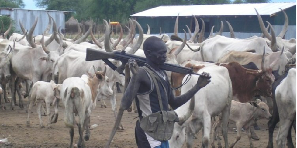 Evicted cattle herders await screening at Kaya Bridge