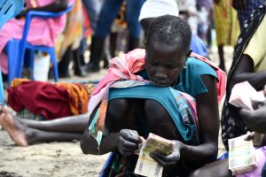 CH11144652_Nyakoth, 68 counts her money received from Save the Children
